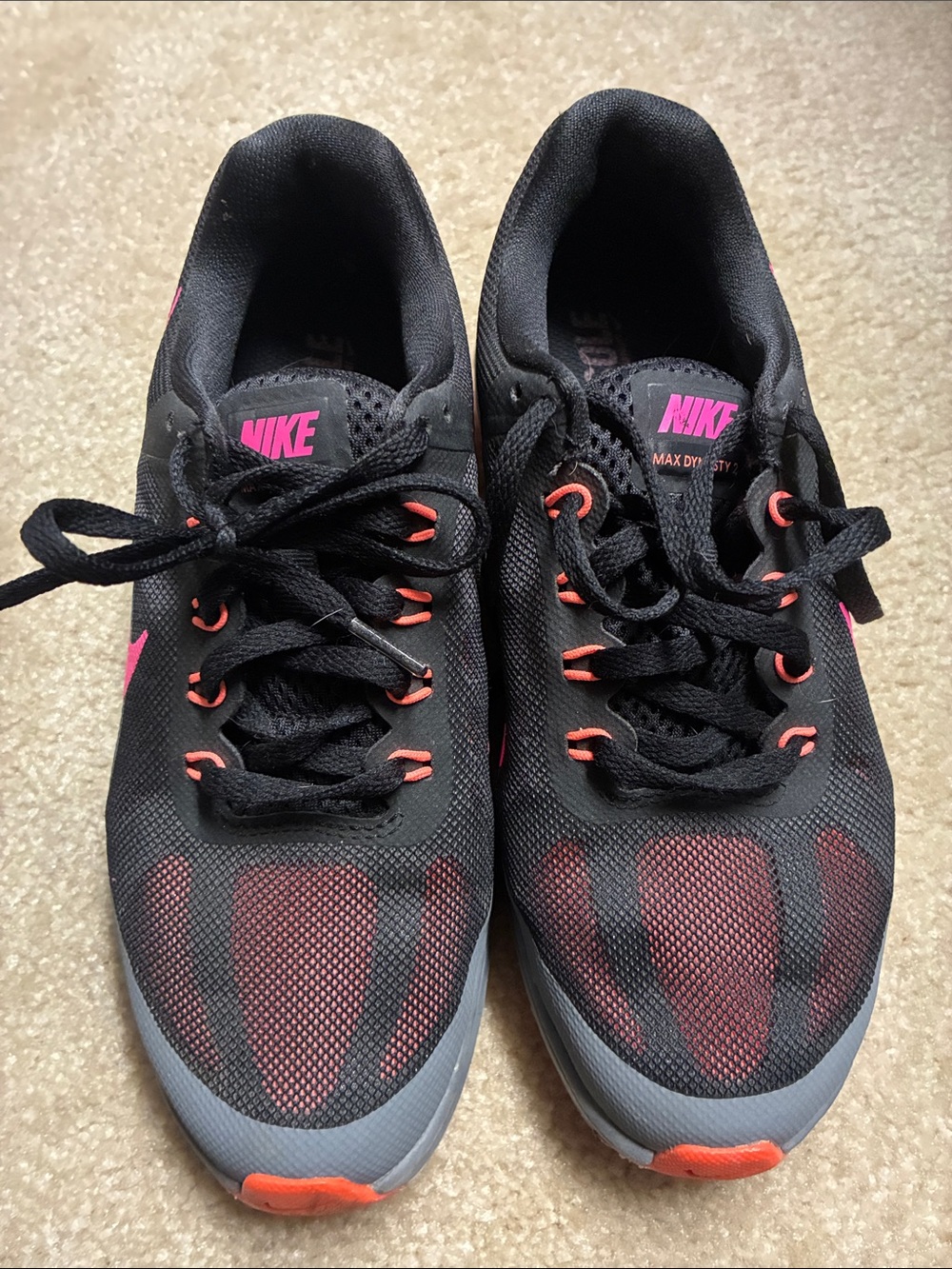 Nike Black Shoes with Pink Swoosh and Orange Soles